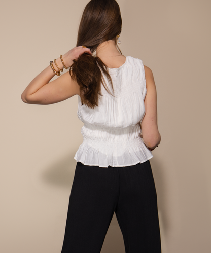 SMOCKED PEPLUM  TOP